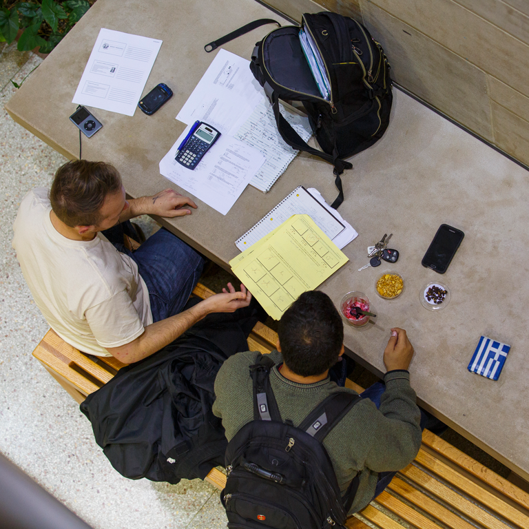 A student receives advice from a tutor.